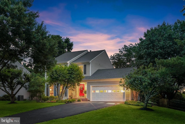 10267 Cedar Ridge Dr, Manassas, VA 20110 - view of front facade with a garage, driveway, a yard, and a shingled roof