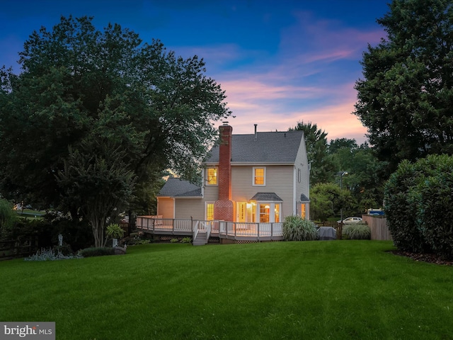 10267 Cedar Ridge Dr, Manassas, VA 20110 - back of property featuring a lawn, a deck, and a chimney