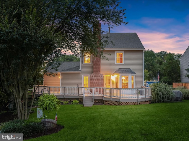 10267 Cedar Ridge Dr, Manassas, VA 20110 - back of property with a yard, a wooden deck, and roof with shingles