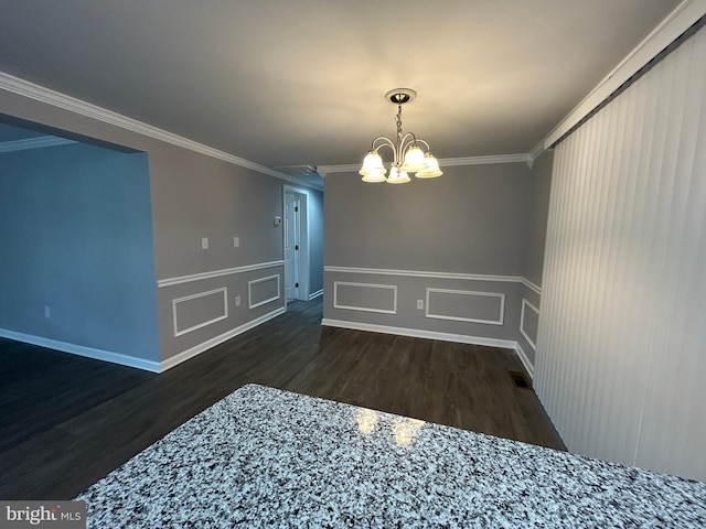36697 W Club House Rd, Ocean View, DE 19970 - unfurnished dining area featuring crown molding, wood finished floors, a chandelier, wainscoting, and a decorative wall