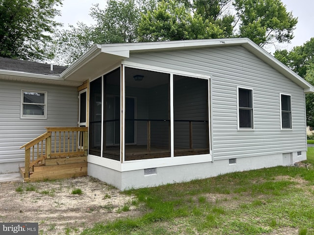 36697 W Club House Rd, Ocean View, DE 19970 - view of side of property featuring a sunroom and crawl space