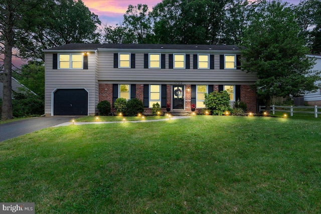 1752 Lark Ln, Cherry Hill, NJ 08003 - view of front facade featuring driveway, a garage, and brick siding