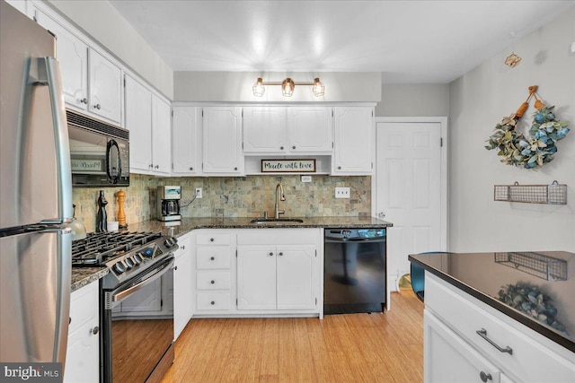 1752 Lark Ln, Cherry Hill, NJ 08003 - kitchen featuring black appliances, backsplash, white cabinetry, and dark stone countertops