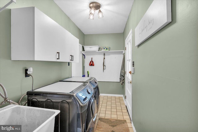 1752 Lark Ln, Cherry Hill, NJ 08003 - laundry room with washing machine and clothes dryer, cabinet space, and light tile patterned flooring