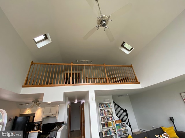 390 Summer Hill Rd, Schuylkill Haven, PA 17972 - detailed view of a ceiling fan, freestanding refrigerator, under cabinet range hood, and a skylight