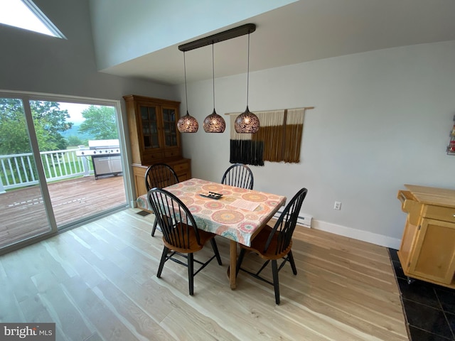 390 Summer Hill Rd, Schuylkill Haven, PA 17972 - dining room featuring plenty of natural light, light wood finished floors, and a high ceiling