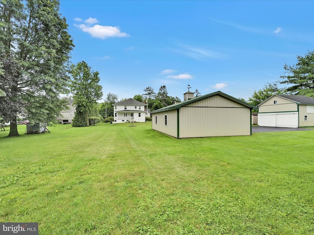1989 Fair Rd, Schuylkill Haven, PA 17972 - view of grassy yard with an outbuilding and a detached garage
