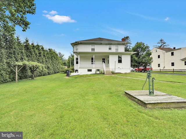 1989 Fair Rd, Schuylkill Haven, PA 17972 - rear view of house with a chimney and a porch