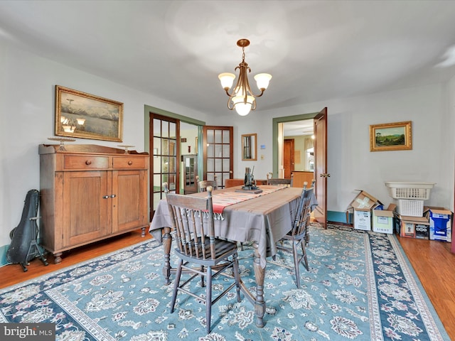 1989 Fair Rd, Schuylkill Haven, PA 17972 - dining space with a chandelier, wood finished floors, and french doors
