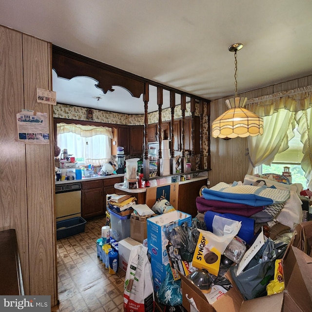 5508 Mayview Ave, Baltimore, MD 21206 - kitchen with tile patterned floors, dishwasher, hanging light fixtures, and light countertops