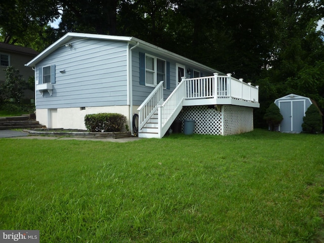 15 University Ave, Baltimore, MD 21228 - view of front facade with a shed, a front yard, a wooden deck, and stairway