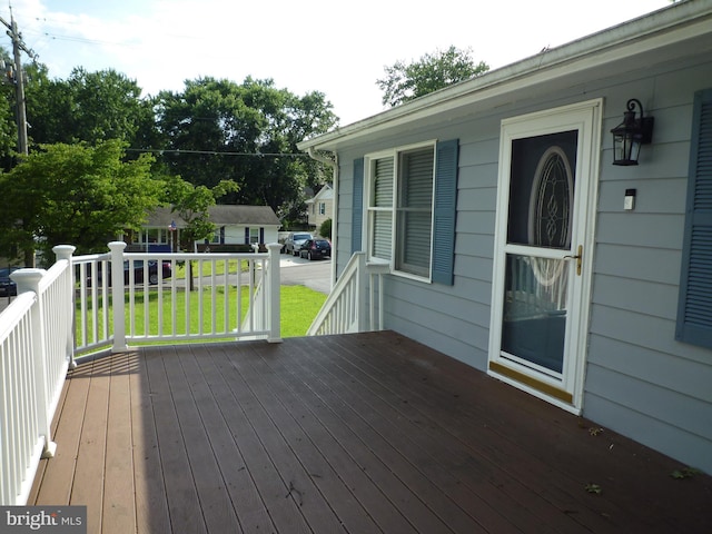 15 University Ave, Baltimore, MD 21228 - wooden terrace with a lawn and an outdoor structure