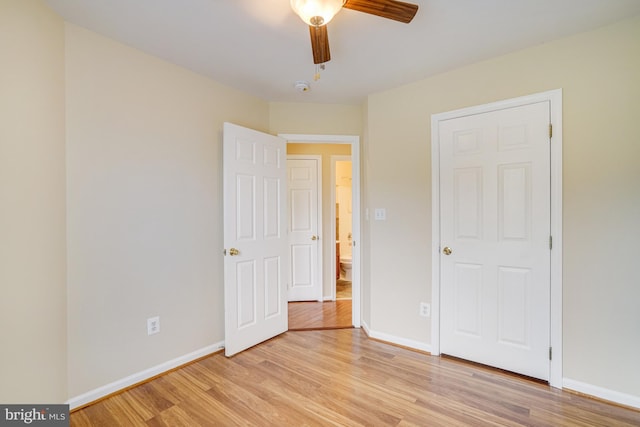 6187 Les Dorson Ln, Alexandria, VA 22315 - unfurnished bedroom featuring light wood-style floors and ceiling fan