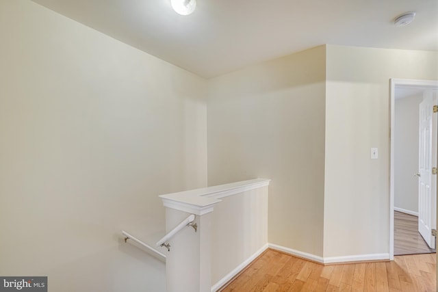 6187 Les Dorson Ln, Alexandria, VA 22315 - corridor featuring an upstairs landing and light wood finished floors