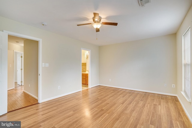 6187 Les Dorson Ln, Alexandria, VA 22315 - spare room featuring ceiling fan, light wood-type flooring, a smoke detector, and plenty of natural light