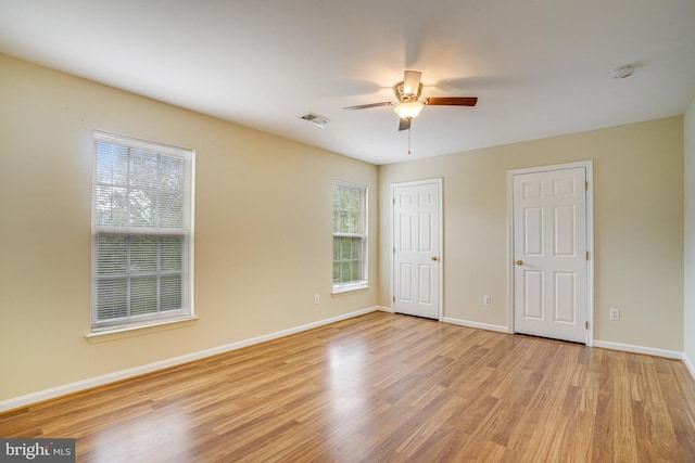 6187 Les Dorson Ln, Alexandria, VA 22315 - unfurnished bedroom featuring light wood-style flooring and ceiling fan