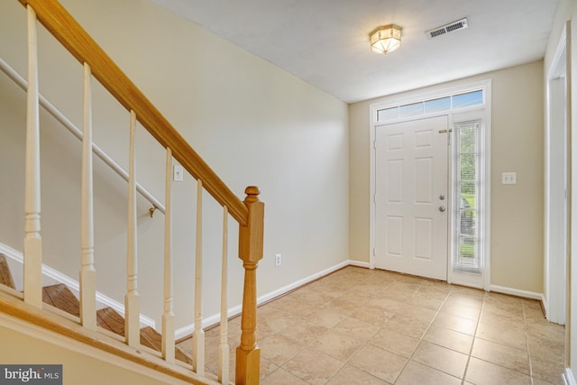 6187 Les Dorson Ln, Alexandria, VA 22315 - foyer entrance featuring stairs and light tile patterned flooring
