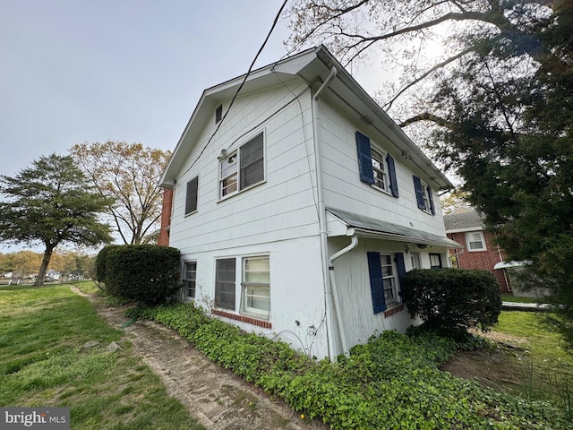 1930 Cedar Rd, Pasadena, MD 21122 - view of home's exterior with a lawn