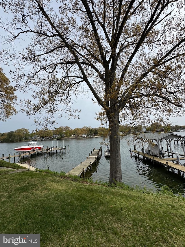1930 Cedar Rd, Pasadena, MD 21122 - dock area featuring a water view and a lawn