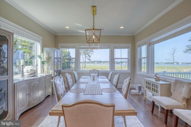 22261 Waterview Rd, Lewes, DE 19958 - dining area featuring recessed lighting, dark wood-type flooring, and ornamental molding