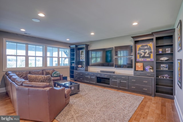 22261 Waterview Rd, Lewes, DE 19958 - living area featuring light wood finished floors and recessed lighting