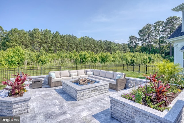 22261 Waterview Rd, Lewes, DE 19958 - fenced backyard featuring an outdoor living space with a fire pit and a patio area