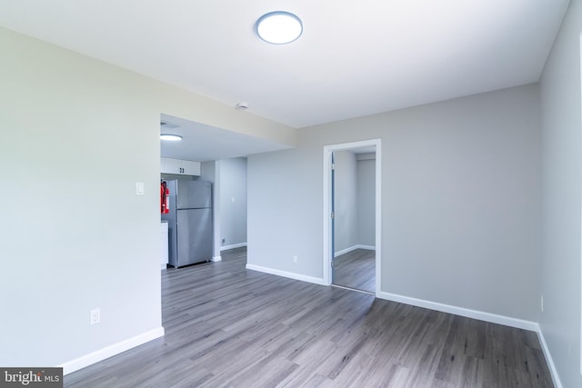 36 Melwood Ct, Sicklerville, NJ 08081 - empty room featuring wood finished floors and a smoke detector