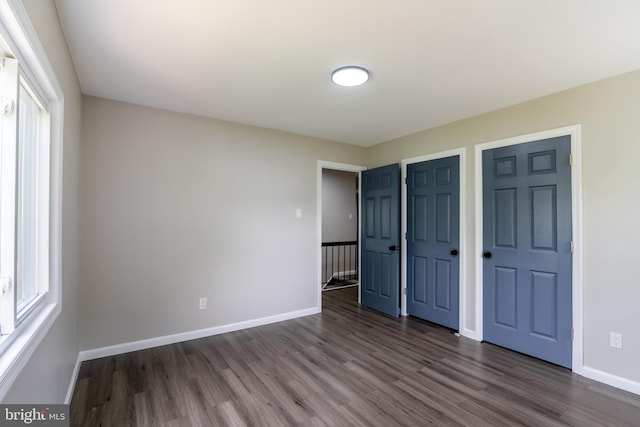 36 Melwood Ct, Sicklerville, NJ 08081 - unfurnished bedroom featuring dark wood-style flooring and baseboards