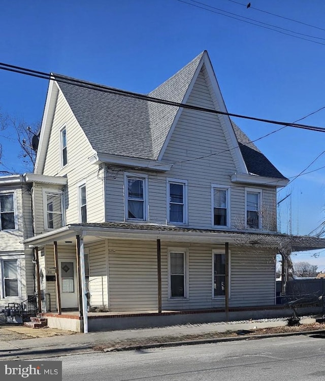 312 N 2nd St, Millville, NJ 08332 - view of front of property with covered porch and a shingled roof