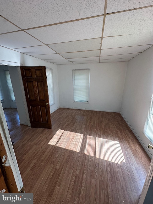 312 N 2nd St, Millville, NJ 08332 - empty room featuring a drop ceiling and wood finished floors