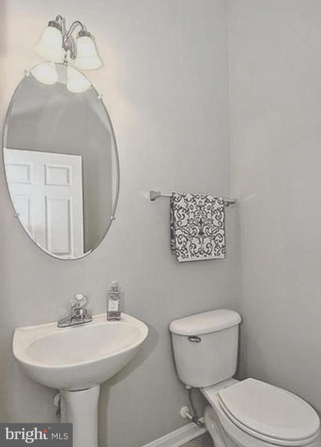 20 Harbour Heights Dr Unit 20, Annapolis, MD 21401 - bathroom featuring toilet and baseboards