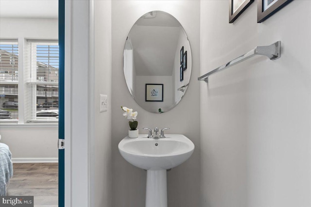 10544 Sally Ride Ln, Lanham, MD 20706 - bathroom with wood finished floors and baseboards