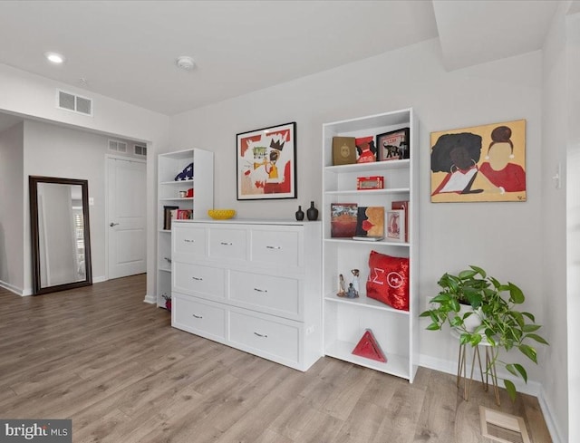 10544 Sally Ride Ln, Lanham, MD 20706 - bedroom with light wood-style flooring and recessed lighting
