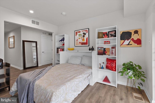 10544 Sally Ride Ln, Lanham, MD 20706 - bedroom featuring wood finished floors and recessed lighting