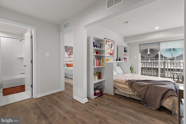 10544 Sally Ride Ln, Lanham, MD 20706 - bedroom with wood finished floors, access to outside, and ensuite bath