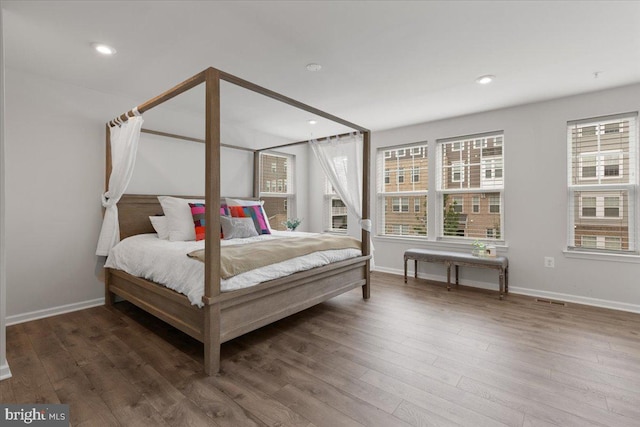 10544 Sally Ride Ln, Lanham, MD 20706 - bedroom with wood finished floors and recessed lighting