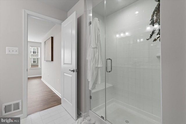 10544 Sally Ride Ln, Lanham, MD 20706 - bathroom featuring a shower stall and tile patterned flooring
