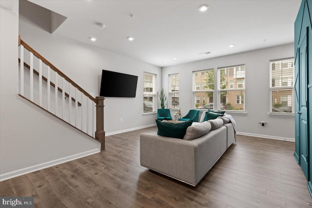 10544 Sally Ride Ln, Lanham, MD 20706 - living area featuring stairway, wood finished floors, and recessed lighting