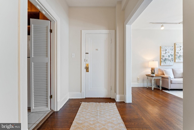 1623 Lanier Pl NW Unit 202, Washington, DC 20009 - entryway featuring wood finished floors and rail lighting