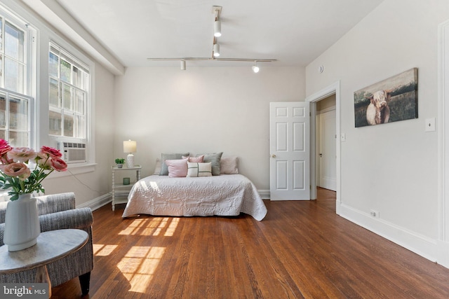 1623 Lanier Pl NW Unit 202, Washington, DC 20009 - bedroom with wood finished floors, track lighting, and cooling unit