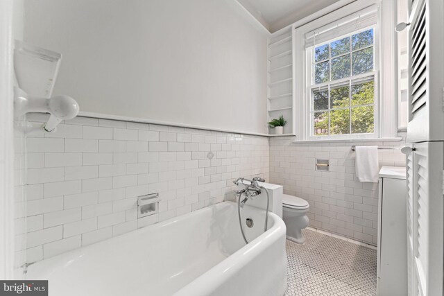 1623 Lanier Pl NW Unit 202, Washington, DC 20009 - full bathroom with a bath, wainscoting, tile patterned floors, vanity, and tile walls