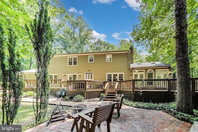 6536 Little Ox Rd, Fairfax Station, VA 22039 - rear view of property with an outdoor fire pit, a patio, a wooden deck, and french doors
