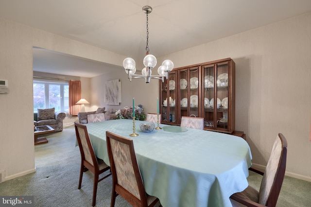 2202 Burkey Dr, Reading, PA 19610 - carpeted dining area featuring a chandelier and baseboards