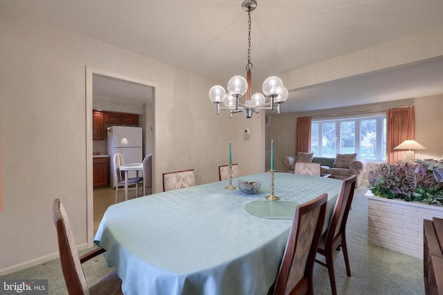 2202 Burkey Dr, Reading, PA 19610 - carpeted dining space featuring a chandelier and baseboards