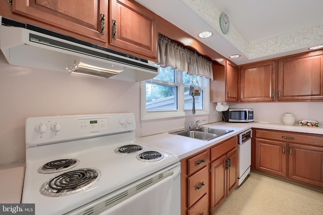 2202 Burkey Dr, Reading, PA 19610 - kitchen featuring white appliances, exhaust hood, and brown cabinetry