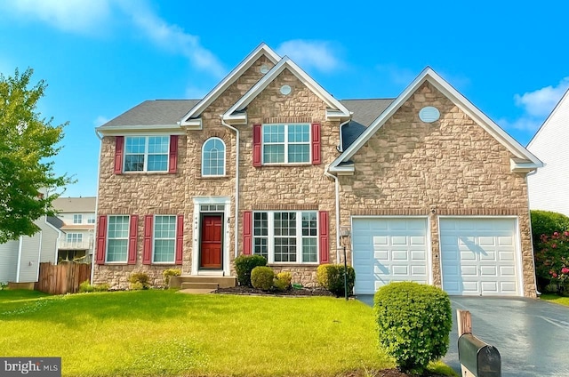 16331 Eagle Flight Cir, Woodbridge, VA 22191 - view of front facade featuring stone siding and concrete driveway