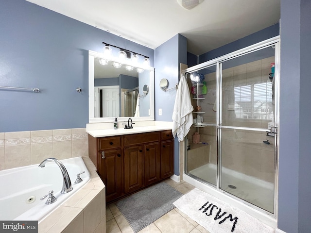16331 Eagle Flight Cir, Woodbridge, VA 22191 - full bathroom featuring a whirlpool tub, vanity, a stall shower, and tile patterned floors