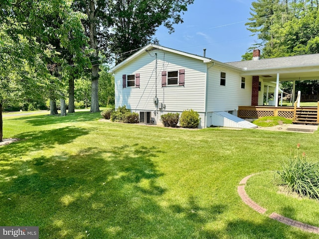13709 Fir Tree Ln, Cresaptown, MD 21502 - view of side of home featuring a lawn, a chimney, and a wooden deck