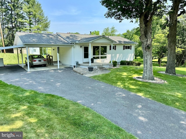 13709 Fir Tree Ln, Cresaptown, MD 21502 - single story home with asphalt driveway, a front yard, a carport, and roof with shingles