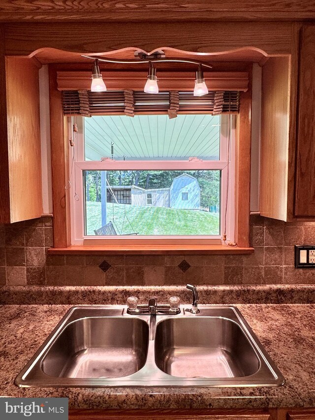13709 Fir Tree Ln, Cresaptown, MD 21502 - detailed view of dark countertops and backsplash